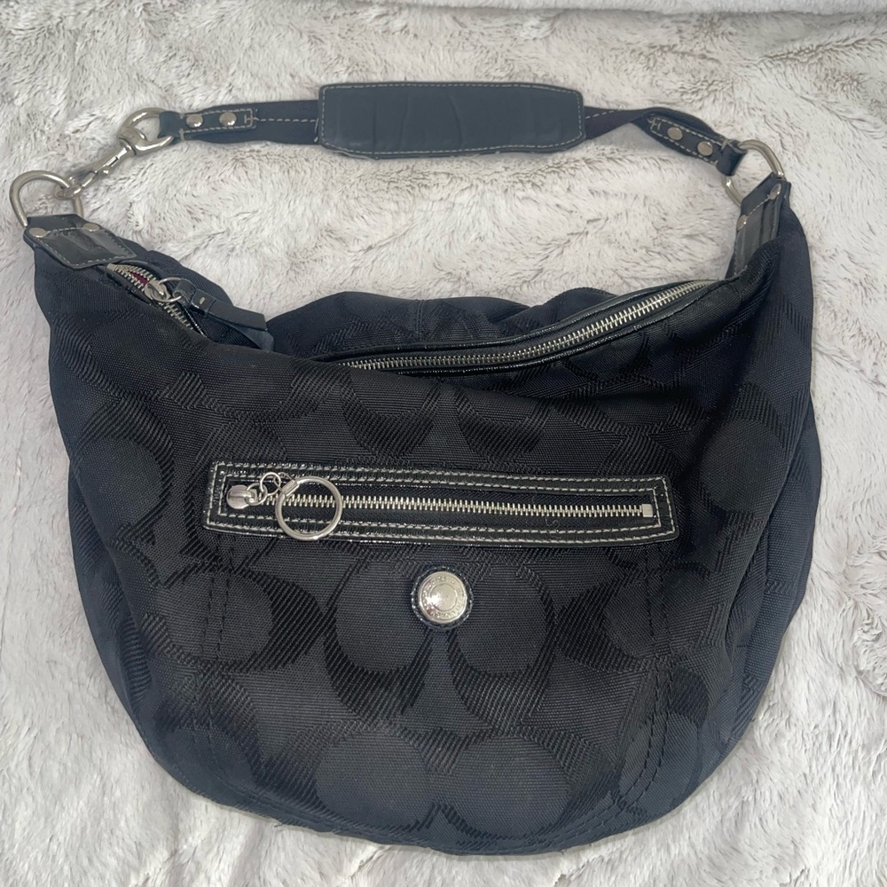 Black Hobo Bag with Adjustable Strap and Crescent Shape